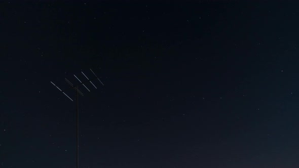 Tv Antenna and Beautiful Night Sky with Stars