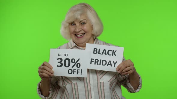 Senior Grandmother Showing Black Friday, 30 Percent Off Discount Advertisement Banners. Chroma Key alt