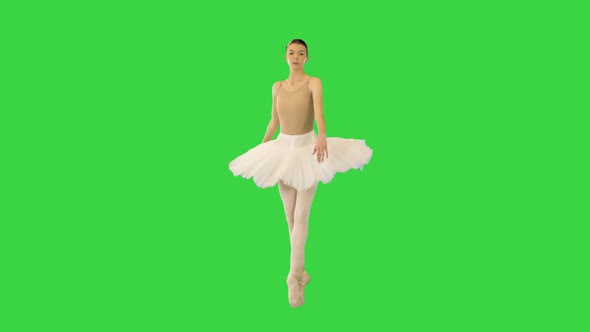 Young Ballerina Walks En Pointe on a Green Screen Chroma Key
