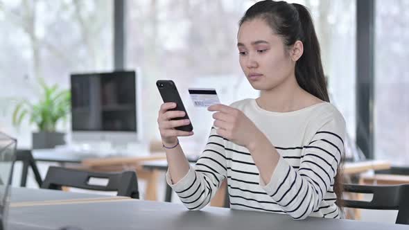 Online Payment Success on Smartphone By Young Asian Woman alt