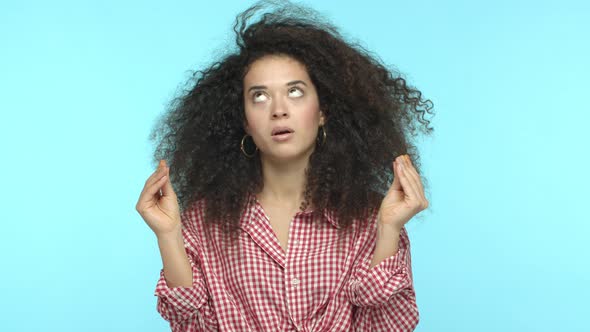 Slow Motion of Stylish Young Woman with Curly Hair Looking Annoyed Mocking Someone Talkative Showing