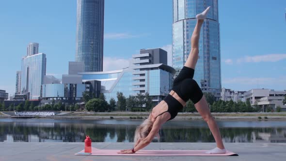 Woman working out in city