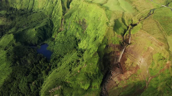 Waterfall and Lake in Poco Ribeira Do Ferreiro Valley Alagoinha Flores Island alt
