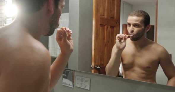 Slow Motion Closeup of Young Man Brushing His Teeth Toothbrush