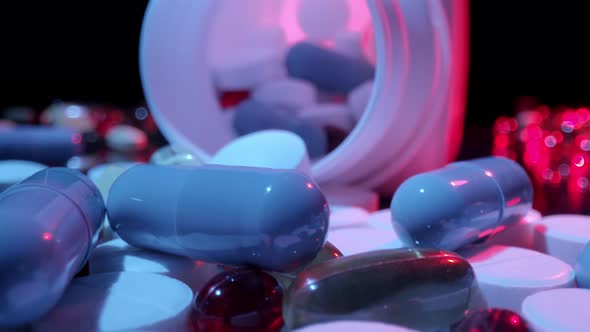 Medications Pills and Tablets Spilled Out of Pill Container alt