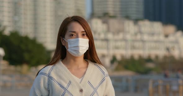 Woman wear face mask for protection