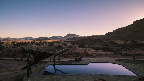Time Lapse in Namibia - African sun setting on yet another day, over the Kalahari desert alt