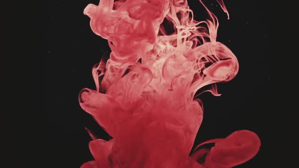 Abstract Red Ink Colour Flowing in Water