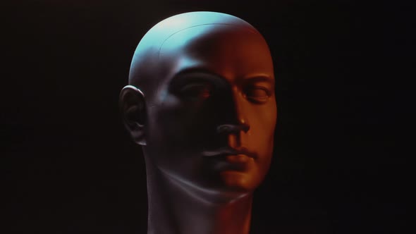 Man's head rotating in the light