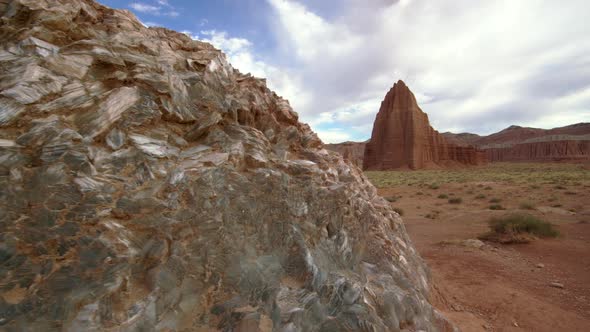 Walking past Glass Mountain viewing Temple of the Sun in Capitol Reef alt