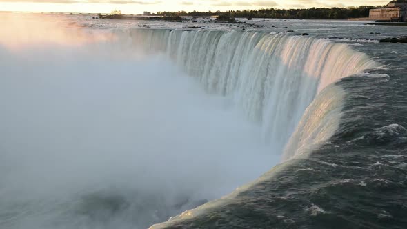 First Ray of Morning Sunlight Touches the Falling Water of Niagara Falls