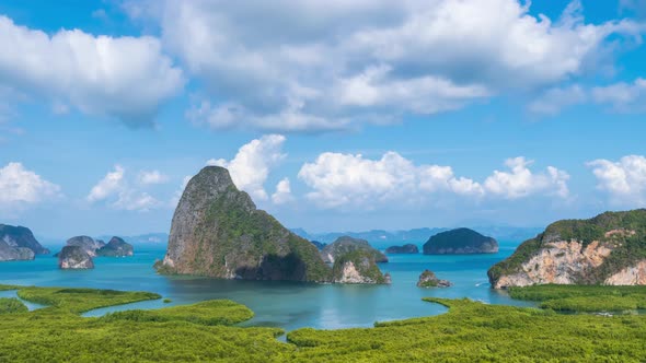 Samet Nangshe viewpoint over Phang-nga Bay and mountains in Andaman sea, Thailand - Time Lapse