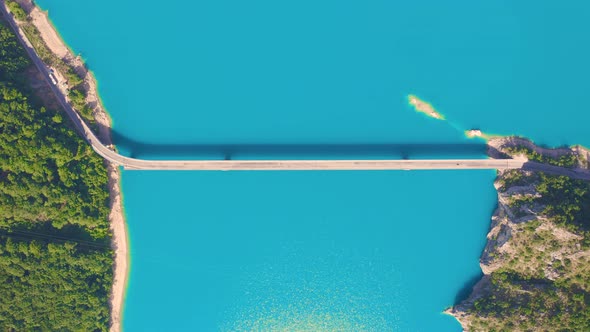 Aerial Top View on Bridge Over Lake Piva with Turquoise Water in Mountains Canyon in Montenegro alt