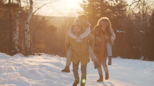 Couples Having Fun Racing Together alt