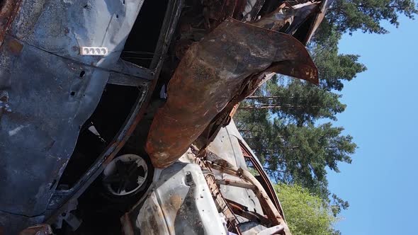 Vertical Video of Destroyed and Shot Cars in the City of Irpin Ukraine alt