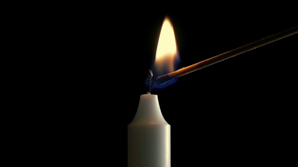 Candle Is Lit Closeup Shot alt