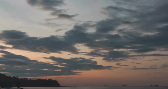 Timelapse Sunrise From Dark to Bright Day Sun Over Sea Waves are Washing alt