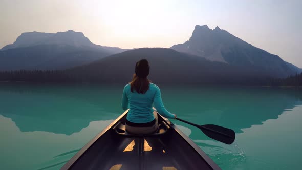 Man travelling on boat in lake alt