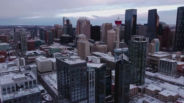 City downtown Calgary skyscrapers space needle winter snow alt