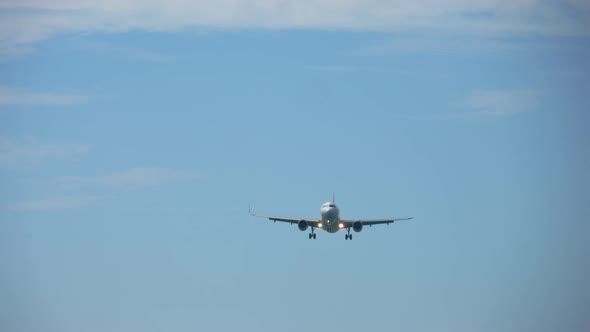 Passenger Plane Flies to Land