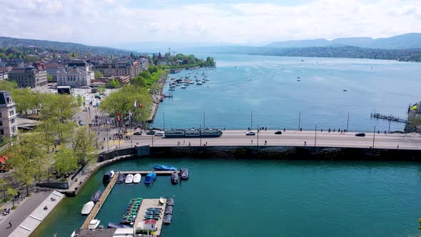 Lake zurich from above with tram crossing alt