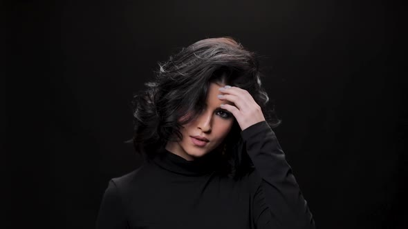 Beautiful Girl Looking at Camera in Studio