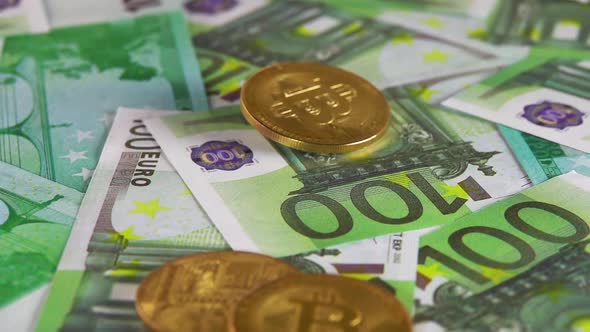 Bitcoin Falls on a Bunch of 100 Euro Banknotes