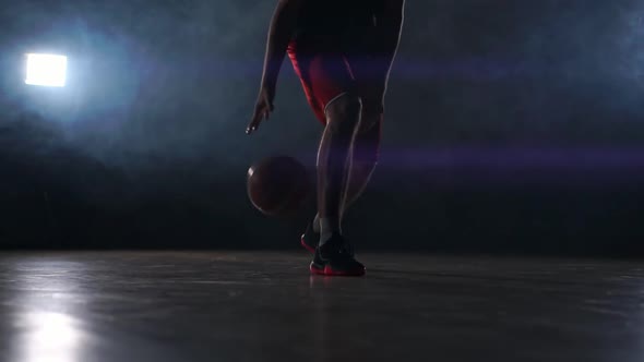 One Young Adult Man, Basketball Player Dribble Ball, Dark Indoors Basketball Court alt