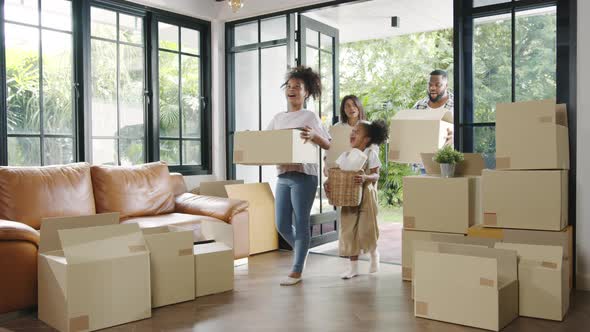 Happy African American young family bought new house alt