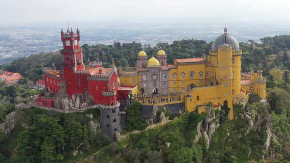Aerial view of Pena Castle on hilltop in Sintra, Lisbon, Portugal. alt