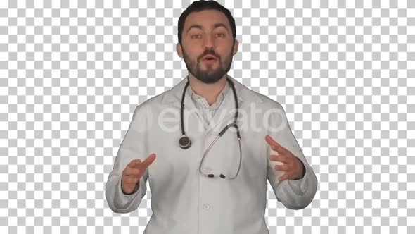 Smiling doctor gesturing thumbs up to camera, Alpha Channel