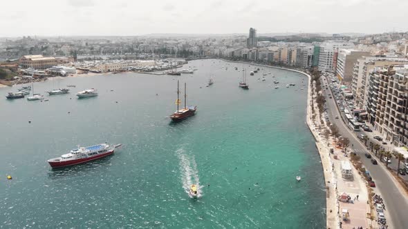 Aerial 4k drone footage of a harbor of the Mediterranean tourist resort town of Sliema, Malta. alt