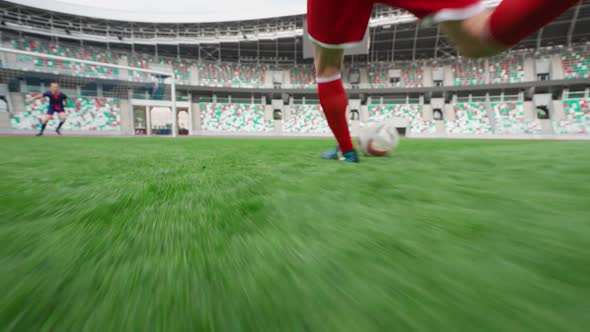 Football Players Play Football on a Stadium Striker Hits and Scores a Goal Training Day on the alt