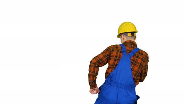 Construction Worker in Helmet Dancing on White Background. alt