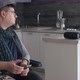 Man in Wheelchair Using Wireless Speaker - VideoHive Item for Sale