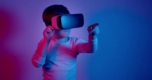 Child Using VR Headset Against Purple and Blue Background