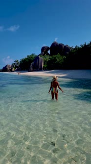 Anse Source d'Argent La Digue Seychelles Young Woman on a Tropical Beach During a Luxury Vacation in alt