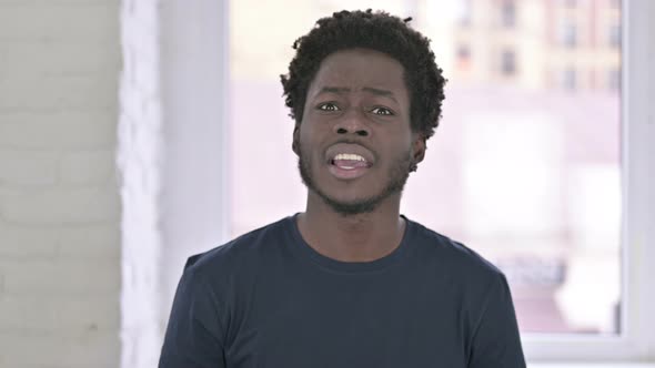 Portrait of Cheerful Young African American Man Doing Video Chat alt