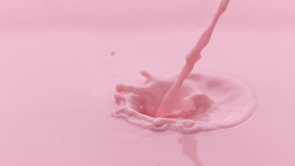 Strawberry milk pouring and splashing in slow motion; shot on Phantom Flex 4K at 1000 fps alt