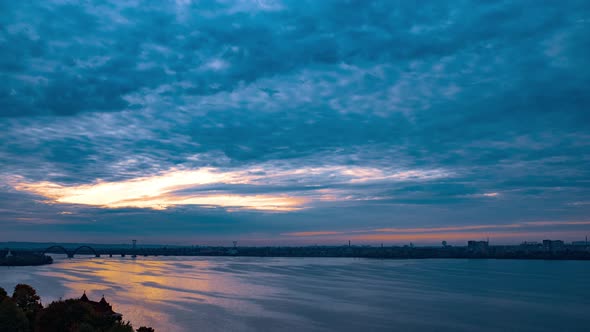 Cloudy Sky Sheltered a Beautiful Shiny River alt