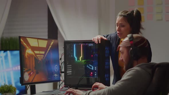 Excited Couple Gamer Winning First Person Shooter Online Video Game alt