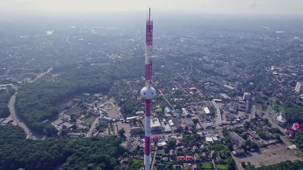 Flying Around the TV Tower Against the Backdrop of a Big City on alt