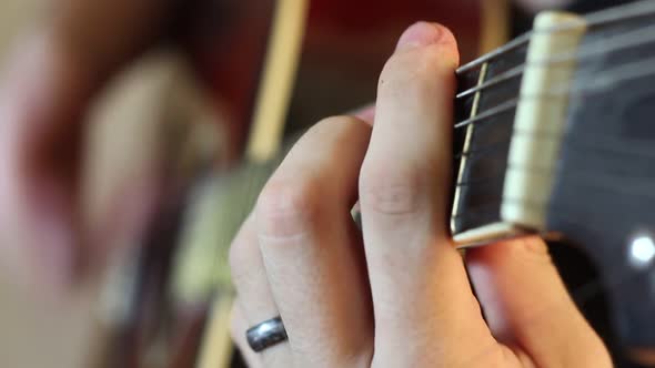 Musician Playing An Acoustic Guitar alt