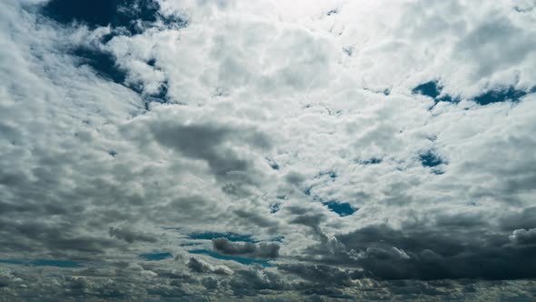 Timelapse Gray Rainy Clouds Float Across the Dark Sky on a Cloudy Day alt