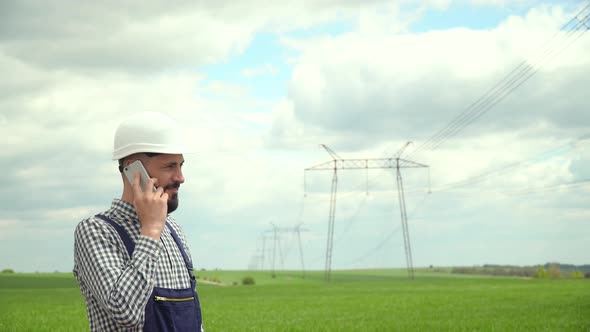 Engineer Working Near Transmission Lines alt