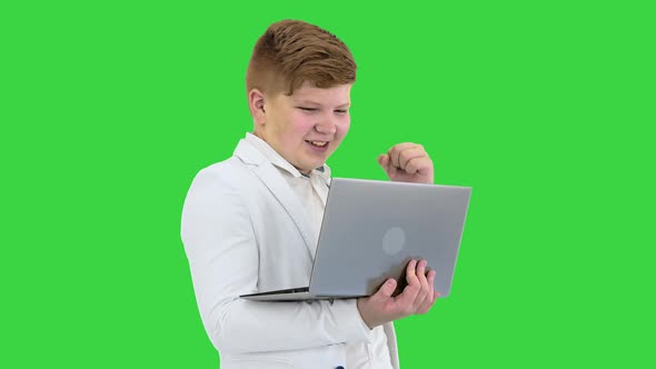 Cool Boy White Suit Standing Using Laptop Making Win Gesture Green Screen Chroma Key alt