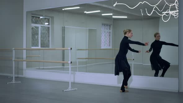 Cheerful Beautiful Young Ballerina Performing Split Leap Smiling Looking at Camera alt