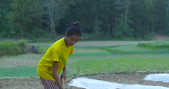Girl Digging Vegetable Garden Soil alt