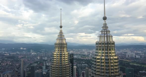 Aerial Filming of Petronas Twin Towers Tops, Done By Drone, Kuala Lumpur, Malaysia, Sunset