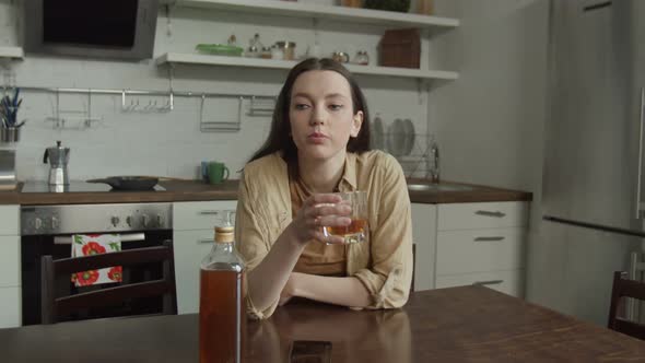 Sad Woman Drinking Suffering From Cheating Husband alt